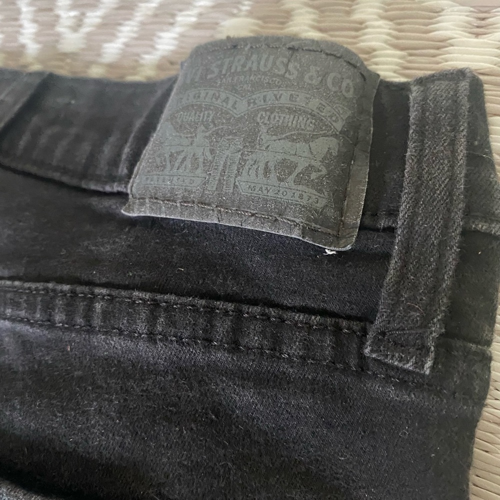 Black Levi jeans pair 1